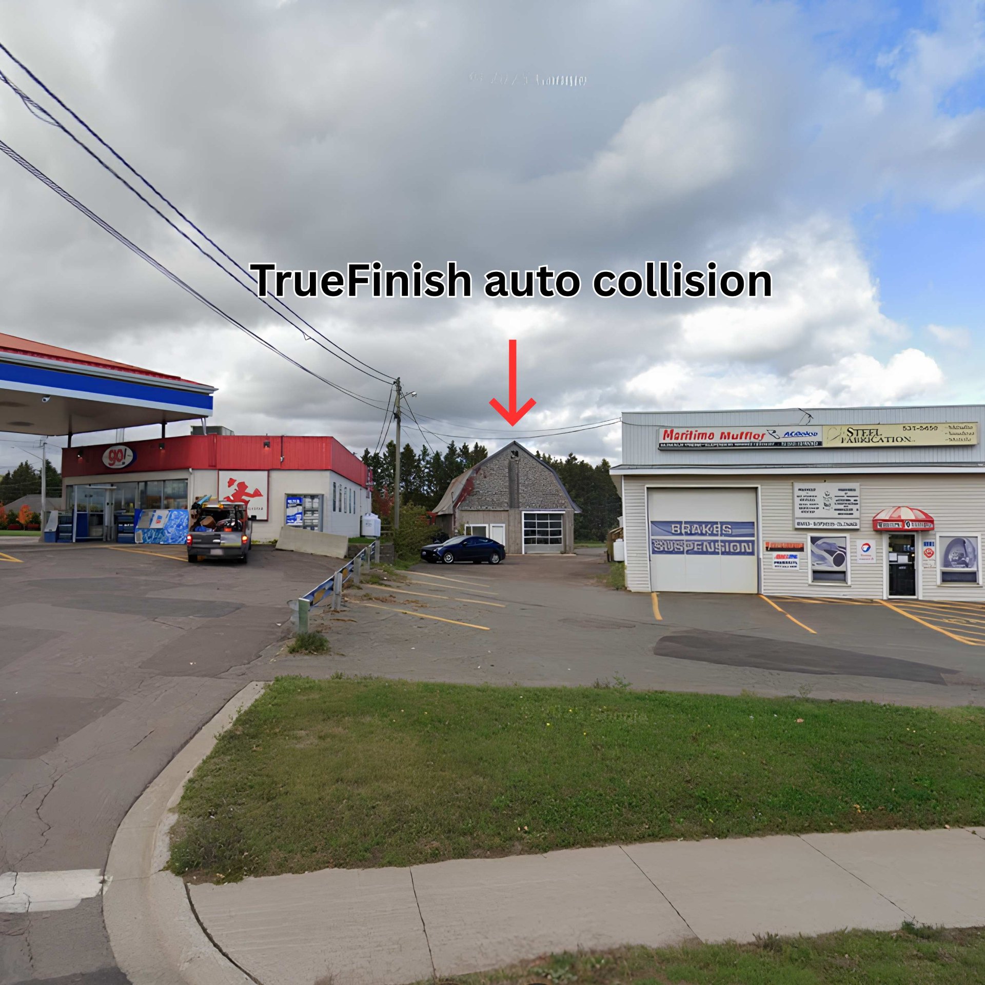 TrueFinish Auto Collision location on Main St, Shediac — the building indicated by the red arrow